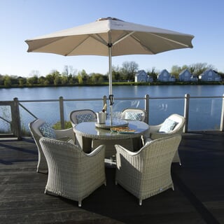 Bramblecrest Monte Carlo 140cm Round Dining Table 
with 60cm Lazy Susan 6
 Armchairs Parasol and Base