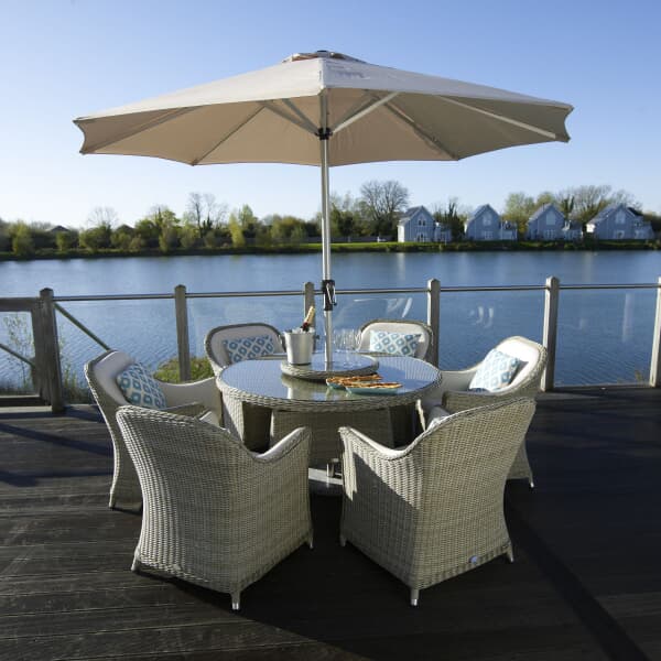 Bramblecrest Monte Carlo 140cm Round Dining Table 
with 60cm Lazy Susan 6
 Armchairs Parasol and Base