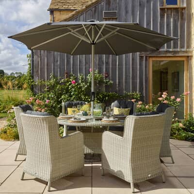 Bramblecrest Chedworth 140cm Round Table 60cm Lazy Susan 6 High-Back Armchairs  Parasol - Dove Grey