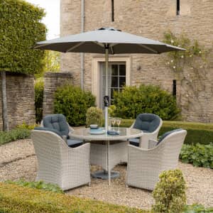 Bramblecrest Monterey 120cm Round Table with 4 Armchairs With Parasol In Dove Grey 2026