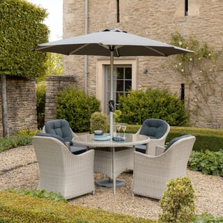 Bramblecrest Monterey 120cm Round Table with 4 Armchairs With Parasol In Dove Grey 2026
