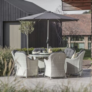 Bramblecrest Monterey 140cm Round Table 60cm Lazy Susan 6 Armchairs  Parasol Dove Grey 