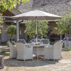 Bramblecrest Monterey 175 x 120cm Elliptical Table with 6 Armchairs and Parasol Dove Grey - 2026