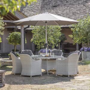 Bramblecrest Monterey 175 x 120cm Elliptical Table with 6 Armchairs and Parasol Dove Grey - 2026