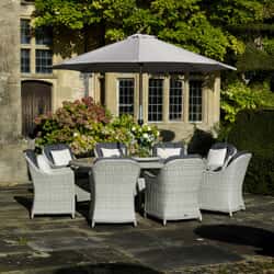 Bramblecrest Monterey 220 x 145cm Elliptical Table with 8 Armchairs and Parasol Dove Grey 2026