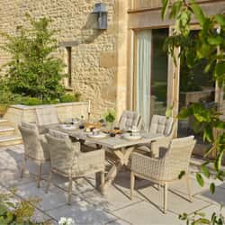 Bramblecrest Monterey Ceramic Rectangle Dining Set with 6 Rattan Vogue Deluxe Armchairs in Sandstone 