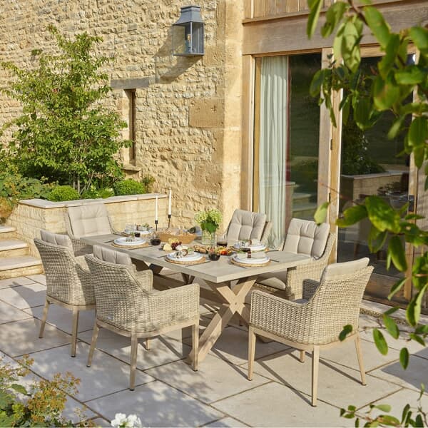 Bramblecrest Monterey Ceramic Rectangle Dining Set with 6 Rattan Vogue Deluxe Armchairs in Sandstone