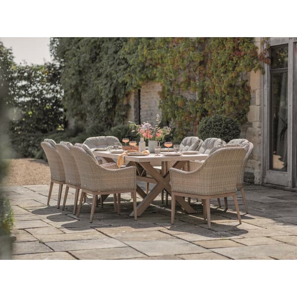 Bramblecrest Monterey Ceramic Rectangle Dining Set with 8 Rattan Vogue  Deluxe  Armchairs in Sandstone