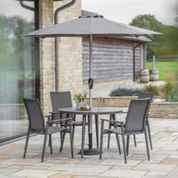 Bramblecrest Sofia 110cm Round Table with 4 Stacking Armchairs Parasol And Base Anthracite