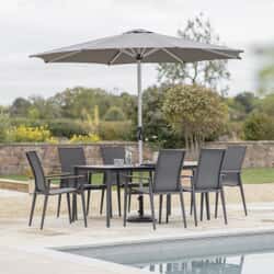 Bramblecrest Sofia 165 x 95cm Rectangle Dining Table with 6 Stacking Armchairs Parasol And Base Anthracite