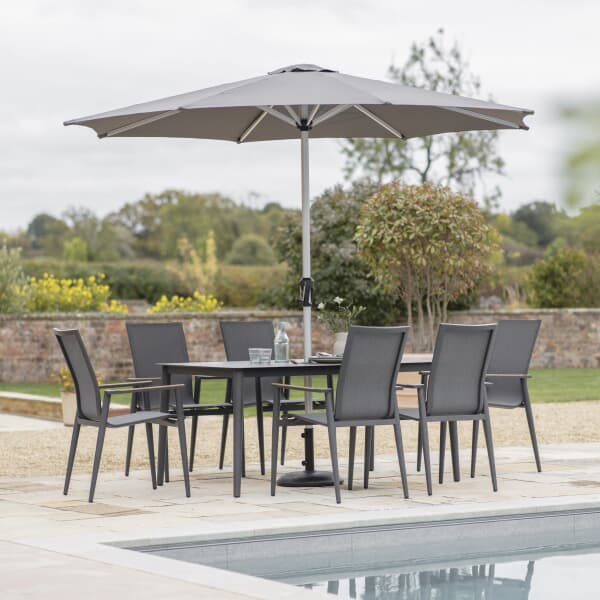 Bramblecrest Sofia 165 x 95cm Rectangle Dining Table with 6 Stacking Armchairs Parasol And Base Anthracite