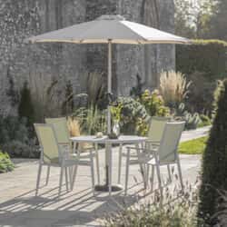 Bramblecrest Sofia 110cm Round Table with 4 Stacking Armchairs Parasol And Base Green