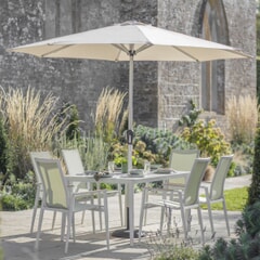 Bramblecrest Sofia 165 x 95cm Rectangle Dining Table with 6 Stacking Armchairs Parasol And Base In Green