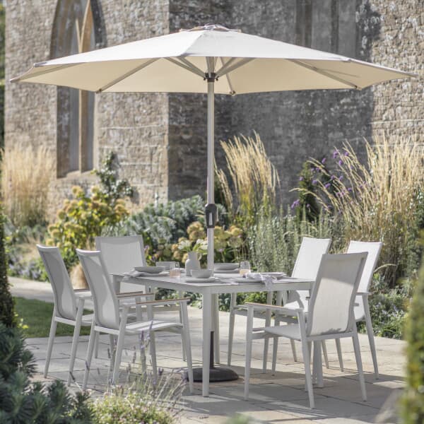 Bramblecrest Sofia 165 x 95cm Rectangle Dining Table with 6 Stacking Armchairs Parasol And Base In Grey