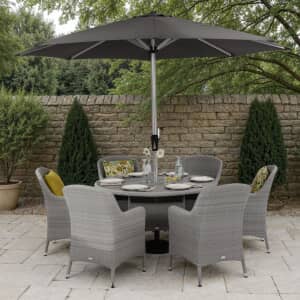 Bramblecrest Tetbury 135cm Tree-Free Round Dining Table with 6 Armchairs Parasol  Base Graphite/Smoke