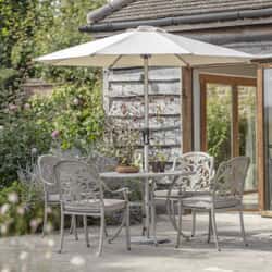 Bramblecrest Venice 100cm Round Table with 4 Stacking Armchairs Parasol And Base Stone